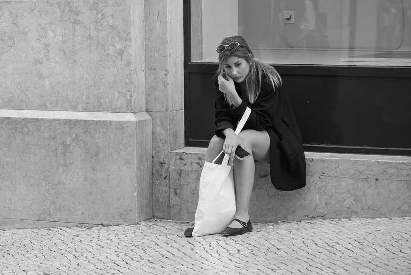 girl sitting in a door step