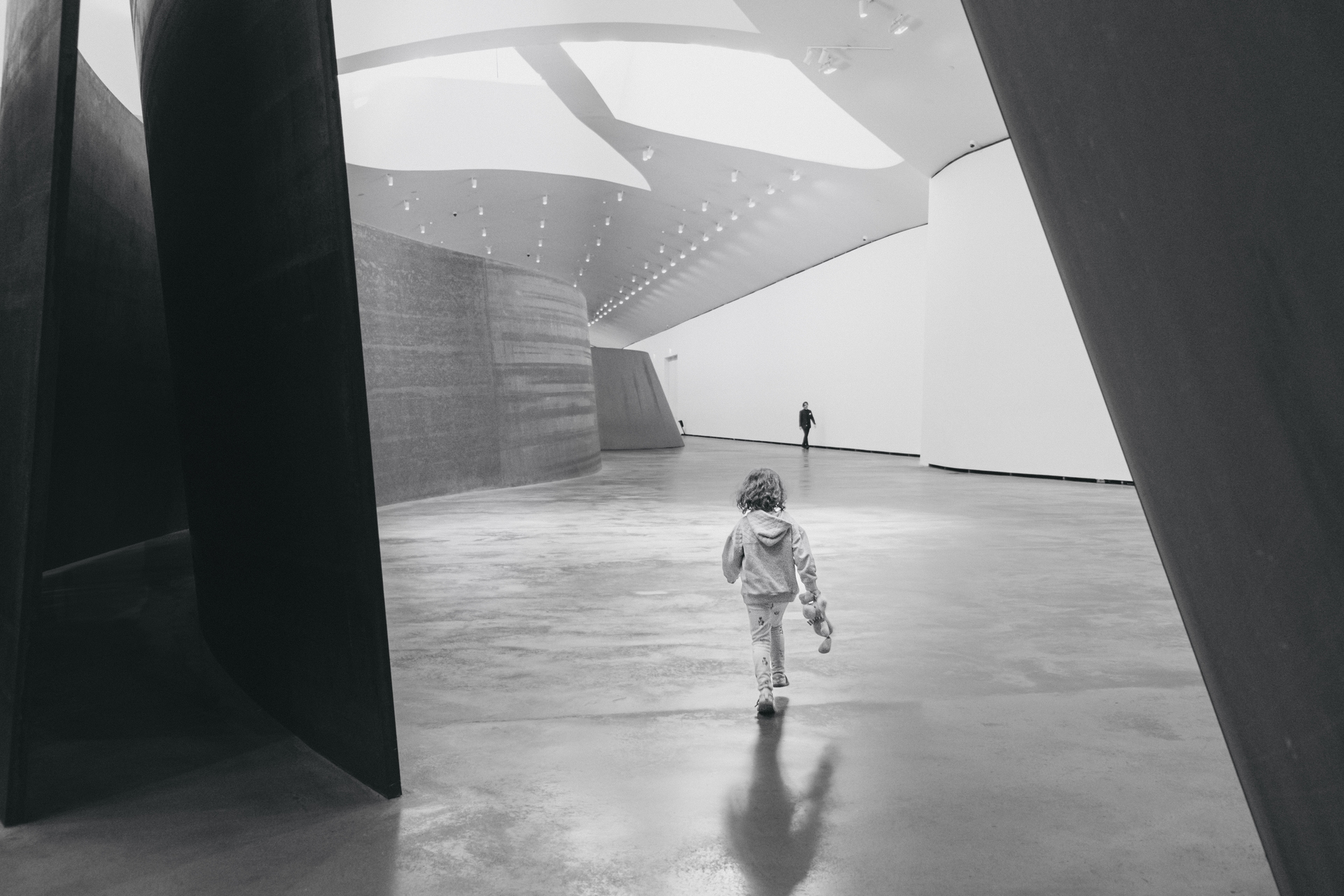 a child walking into the background