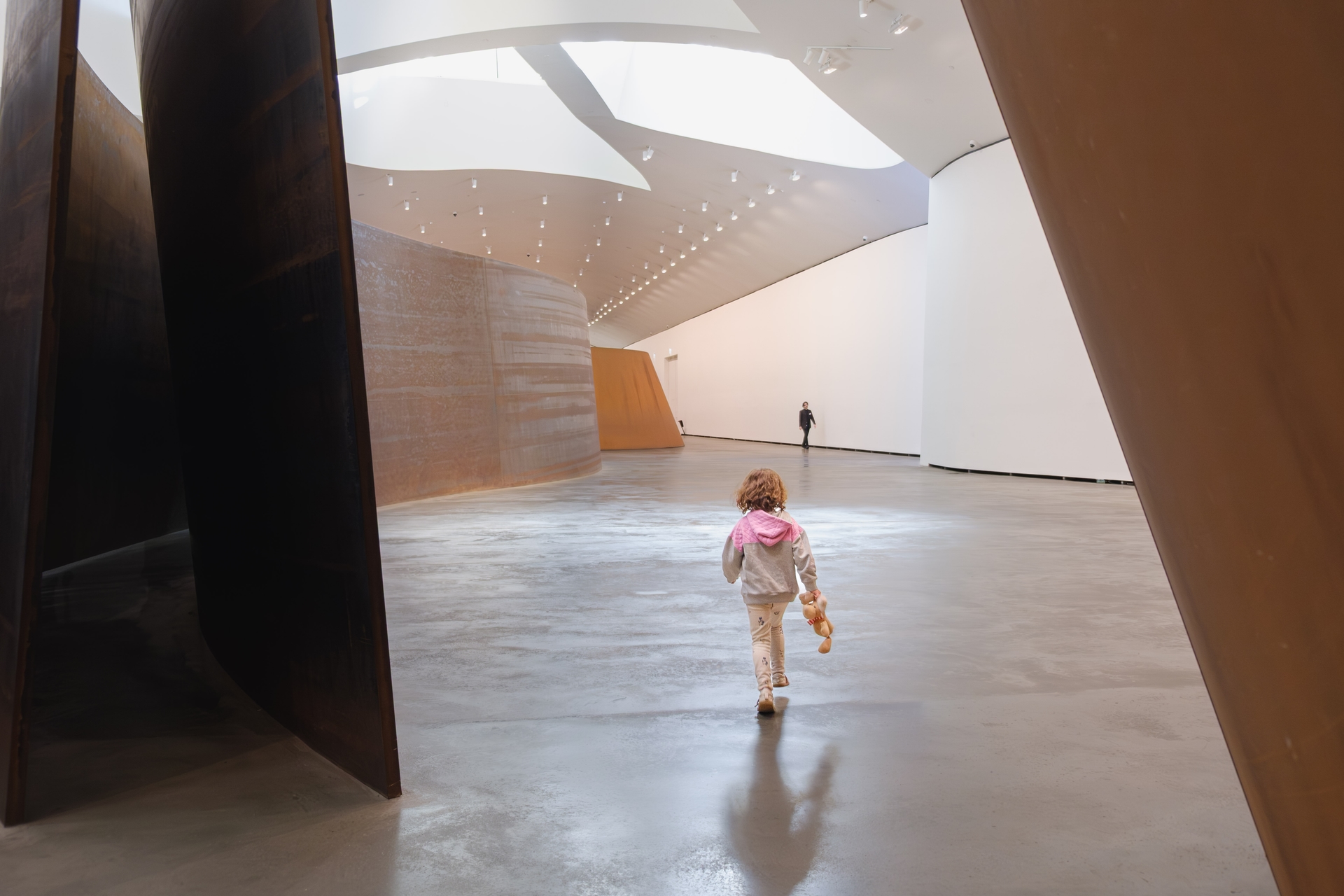 a child walking into the background